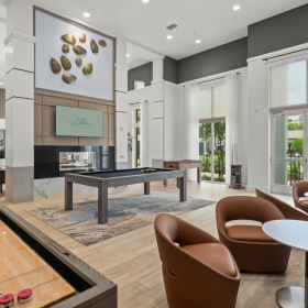 vast game room with shuffleboard table